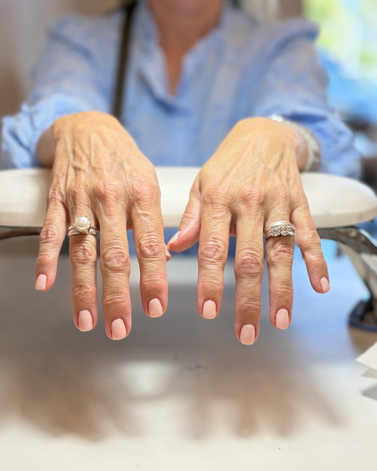 A soft rose gel manicure on natural nails.